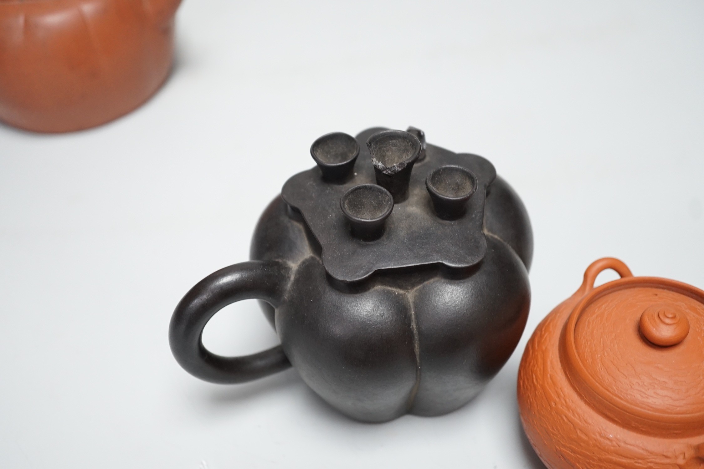 Four Chinese Yixing pottery teapots, tallest 10cm